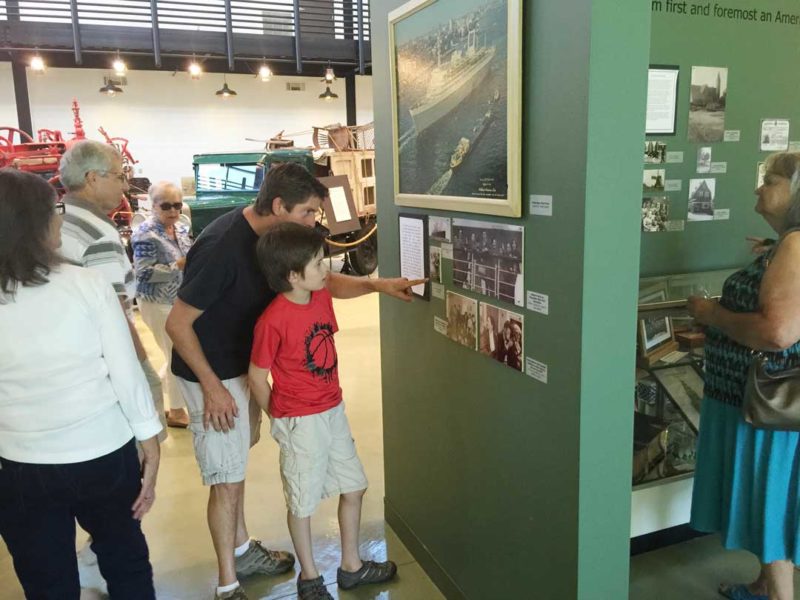Father and son viewing exhibit at Tulare County Museum