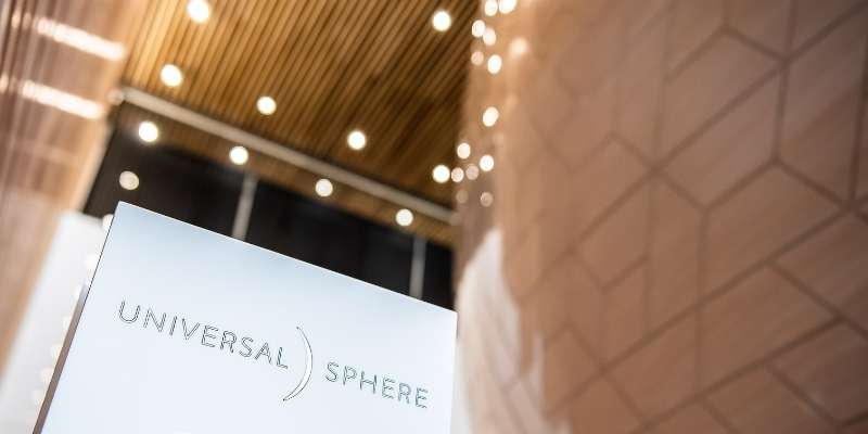 Universal Sphere at Comcast Campus sign