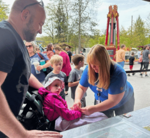 Knoebels Guest Services with Guest in wheelchair