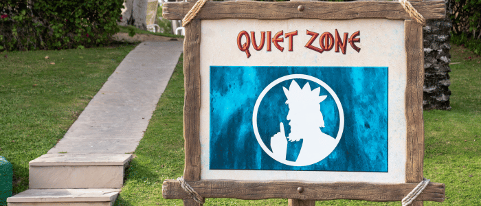 A quiet zone signage in a park.