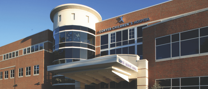 Atlantic Health Morristown Medical Center Gagnon Pediatric Emergency Department Exterior view of Goryeb Children's Hospital featuring a modern design, large windows, and a welcoming entrance.