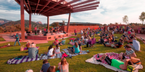 Crowd of people attending an outdoor concert in Sedona
