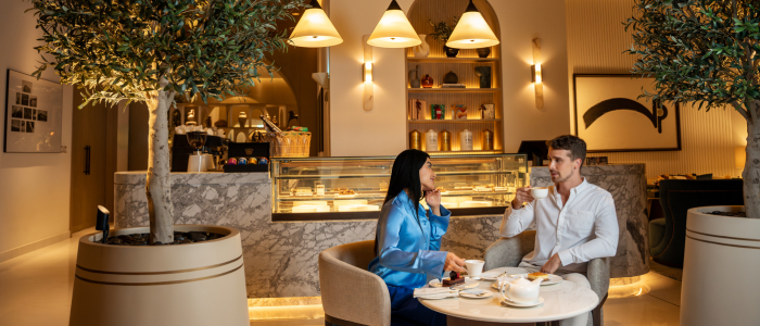 Couple inside of the Palace Dubai Creek Harbour restaurant