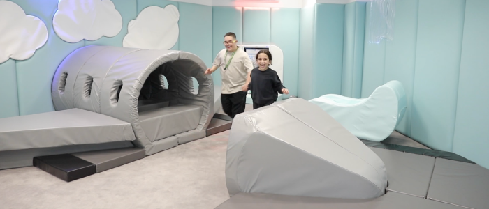 POD Kids Having fun in a padded room at Zayed international Airport
